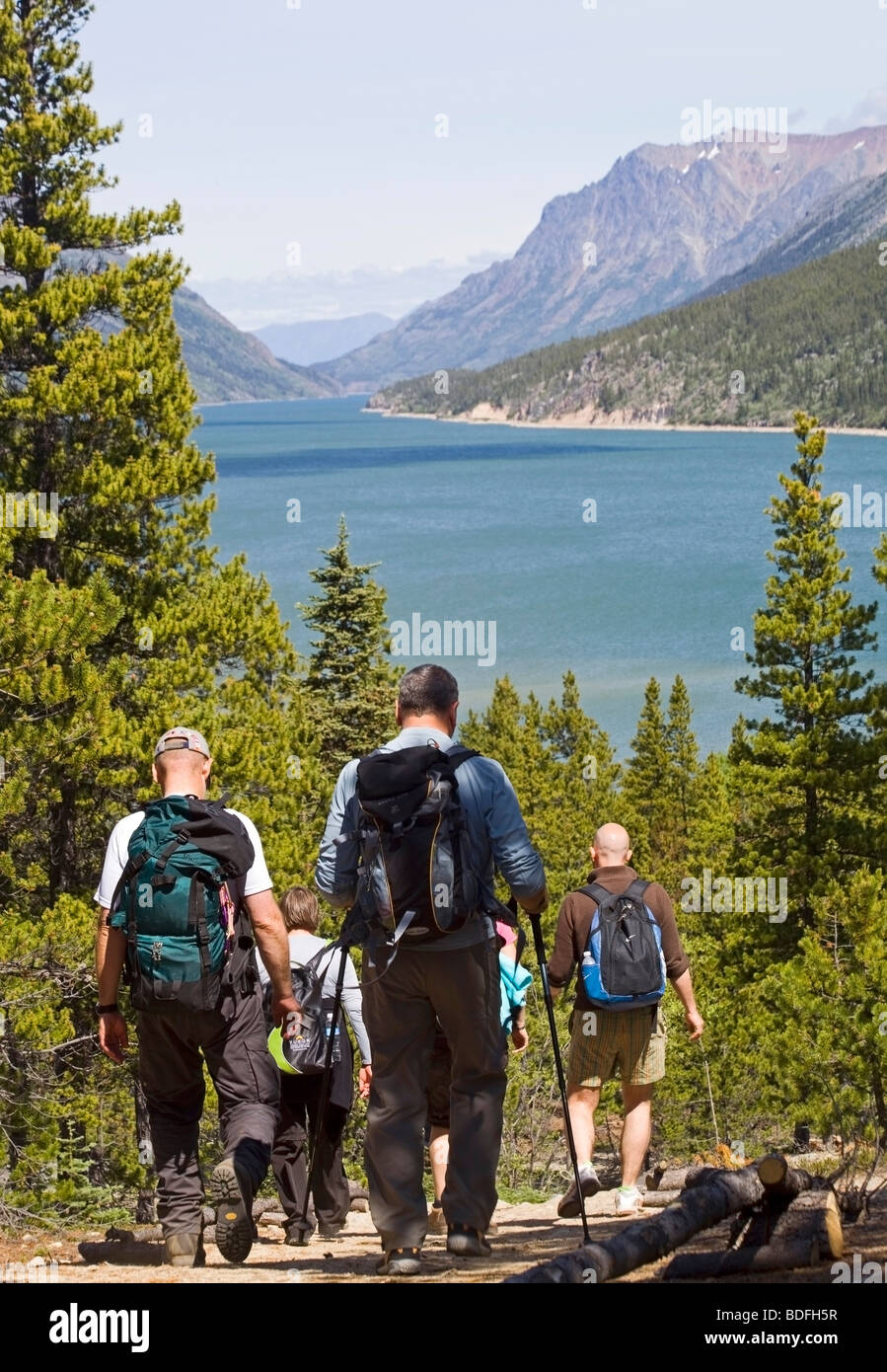 Group of hikers descending toward the historic Bennett, Klondike Gold Rush, Lake Bennett behind, Chilkoot Pass, Chilkoot Trail, Stock Photo