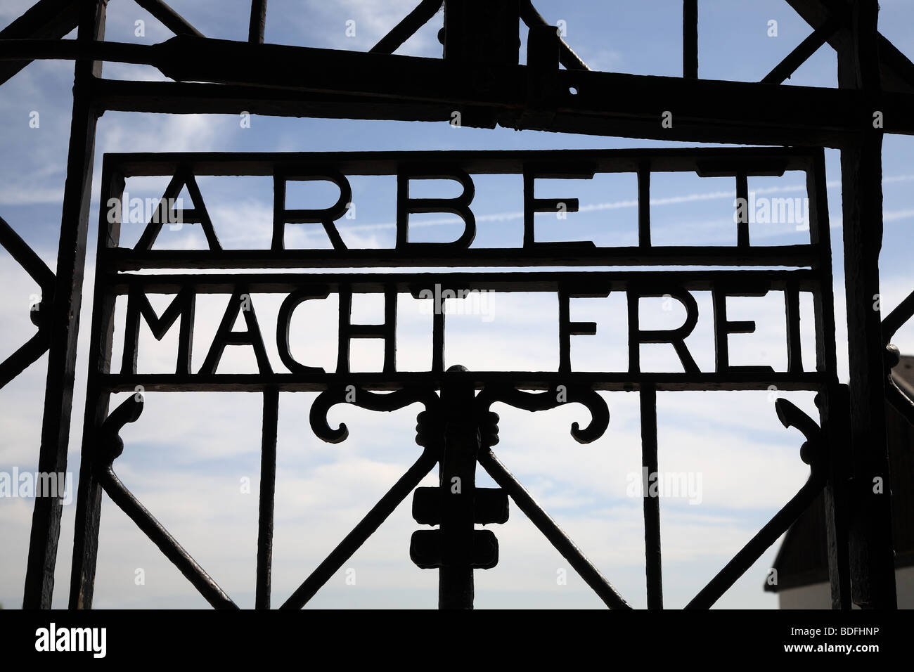 'Arbeit Macht Frei - Work Frees You' Iron gate at the main entrance of the Dachau Concentration Camp, Bavaria, Germany Stock Photo