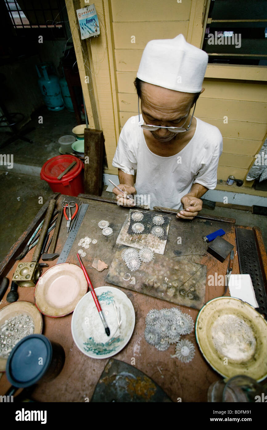 Silversmith making silver jewellery in Terengganu, Malaysia Stock Photo