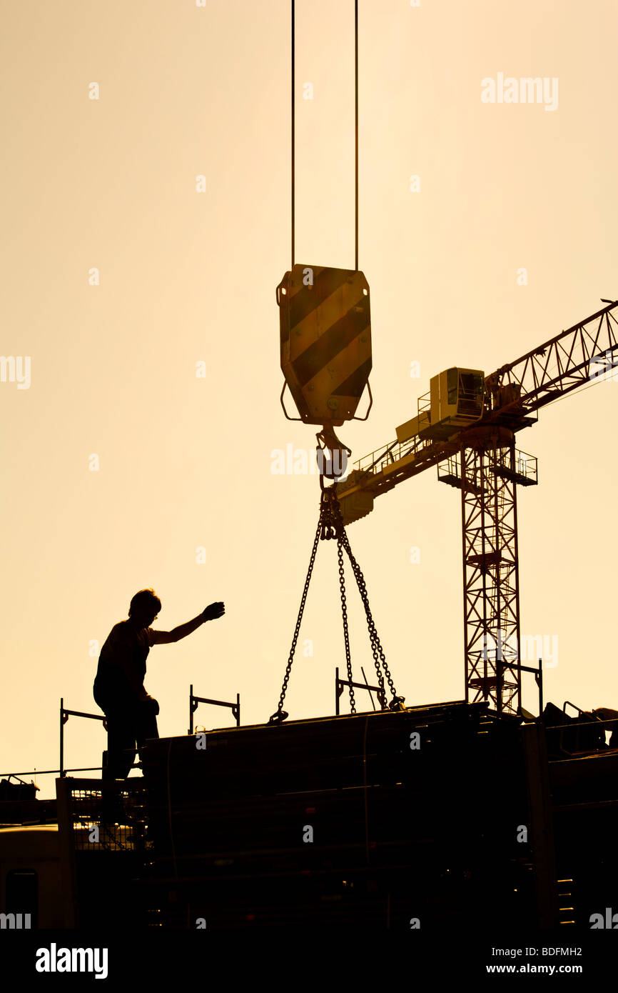 Crane Lifting Load Construction Site High Resolution Stock Photography