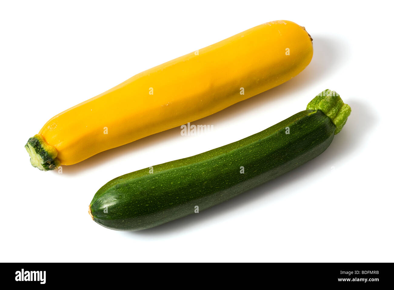fresh yellow and green zucchini isolated on white background Stock