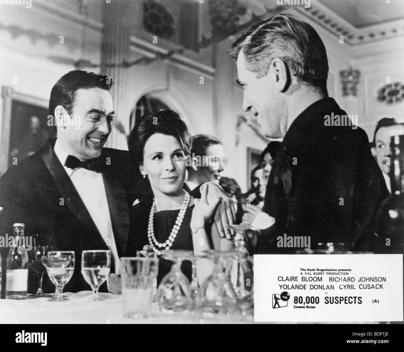 80,000 SUSPECTS  - 1963 Rank film with Claire Bloom and Richard Johnson at left Stock Photo