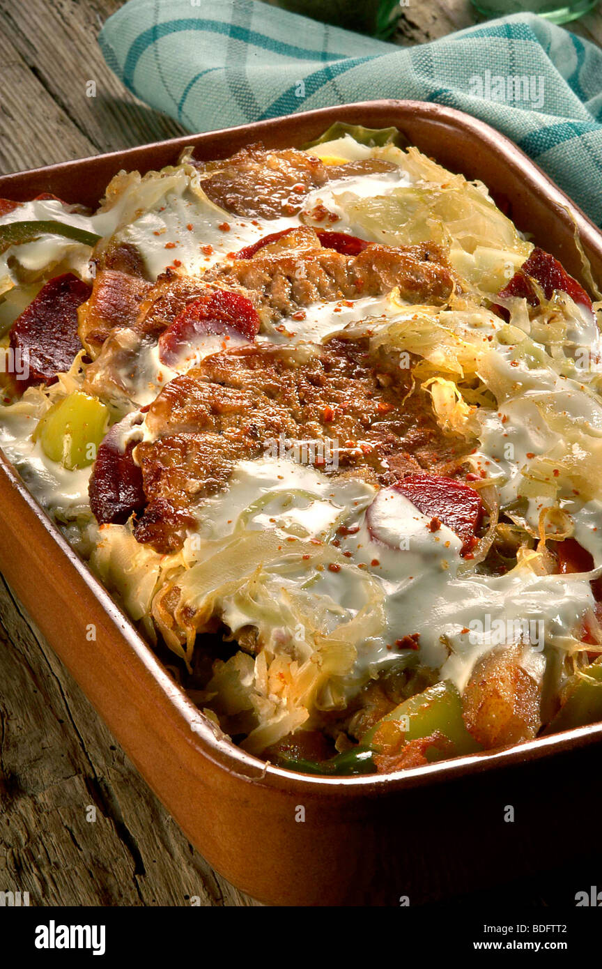 Baked Pork in Cabbage Stock Photo Alamy