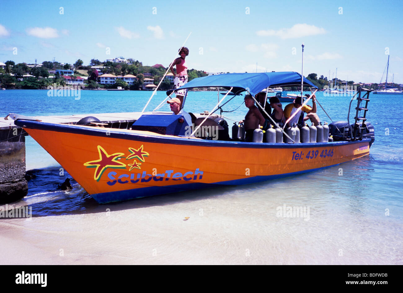 Dive boat returns to base in prickly bay hires stock photography and