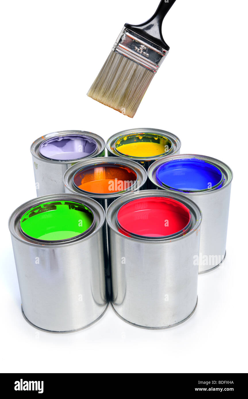 Open cans of paint with clean brush isolated over white background Stock Photo