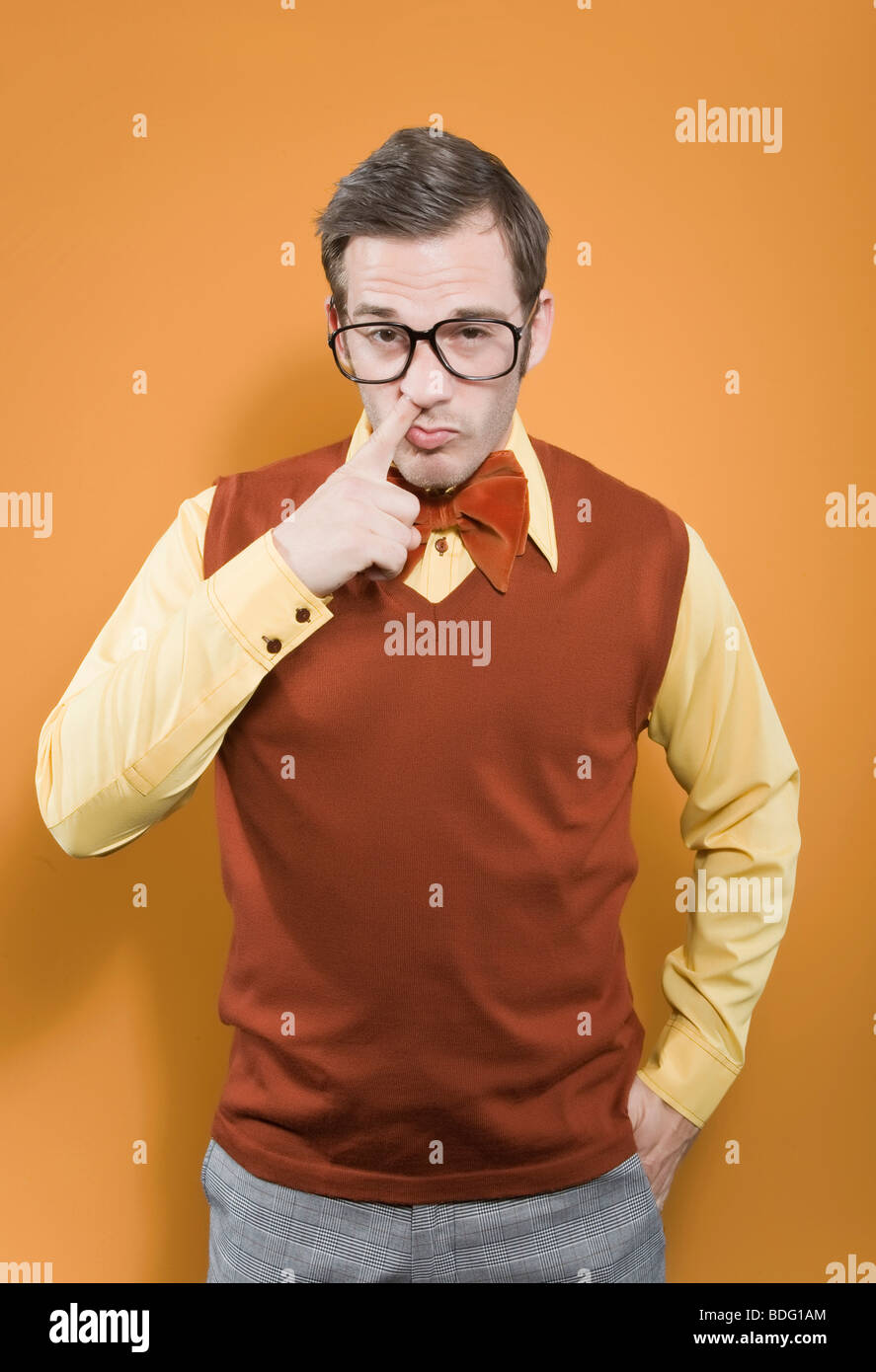 Nerd picking his nose Stock Photo - Alamy