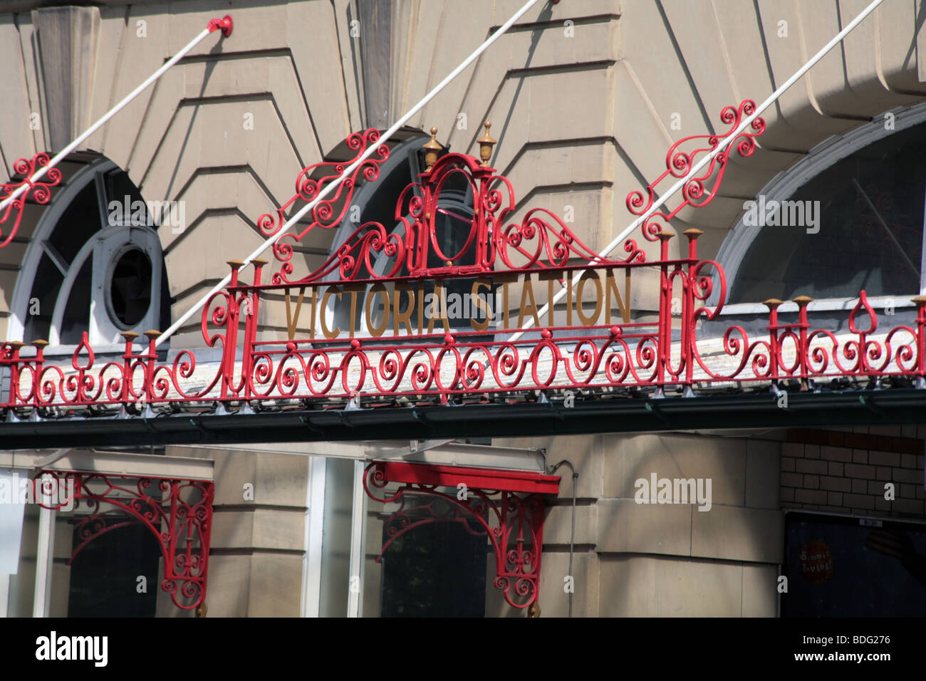 Cast Iron ornate destination signs on the canopy of Manchester Victoria Station England Stock Photo