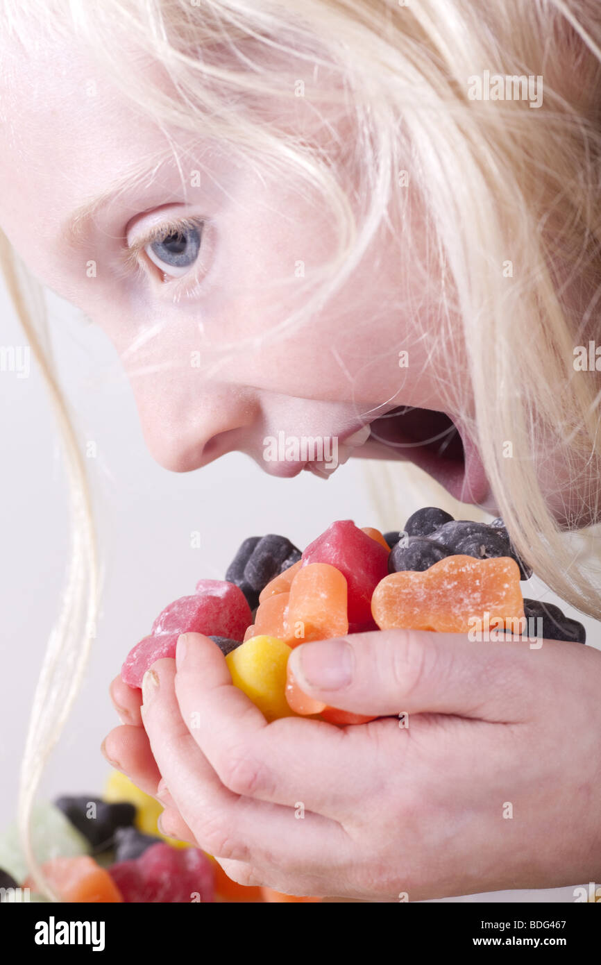 child eating jelly babies Stock Photo