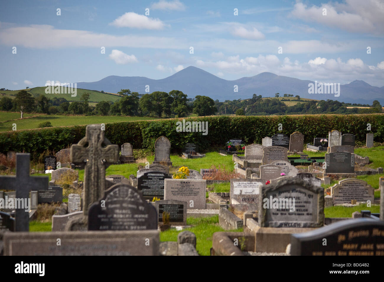 Mourne mountains from cemetery beside St. Patrick's cathedral,  Downpatrick, Northern Ireland Stock Photo