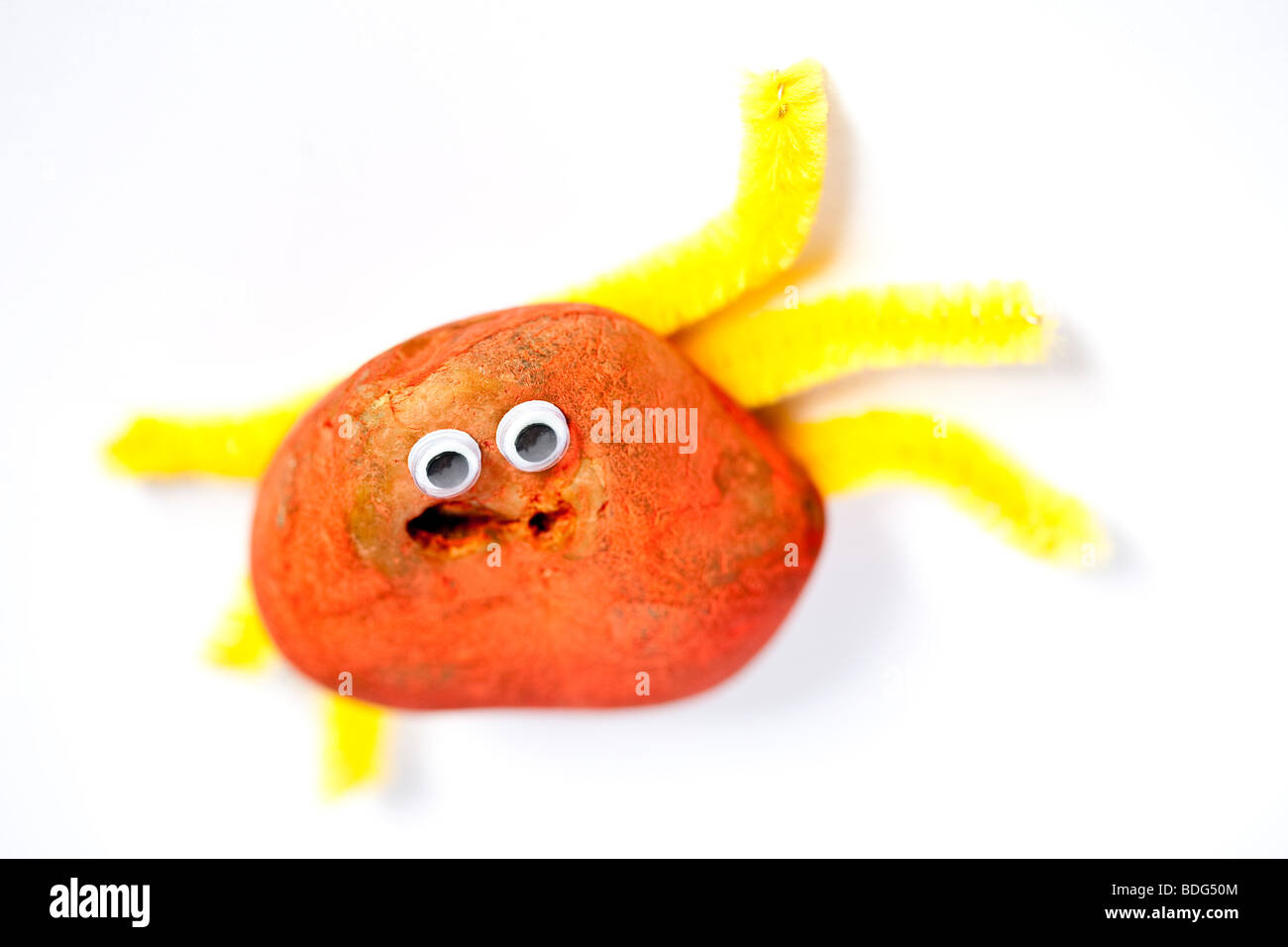 Toy bug made from a stone Stock Photo