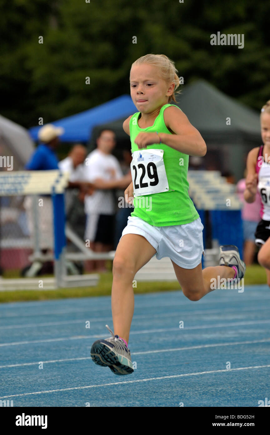 Young girl runner at the Track and Field competition during the