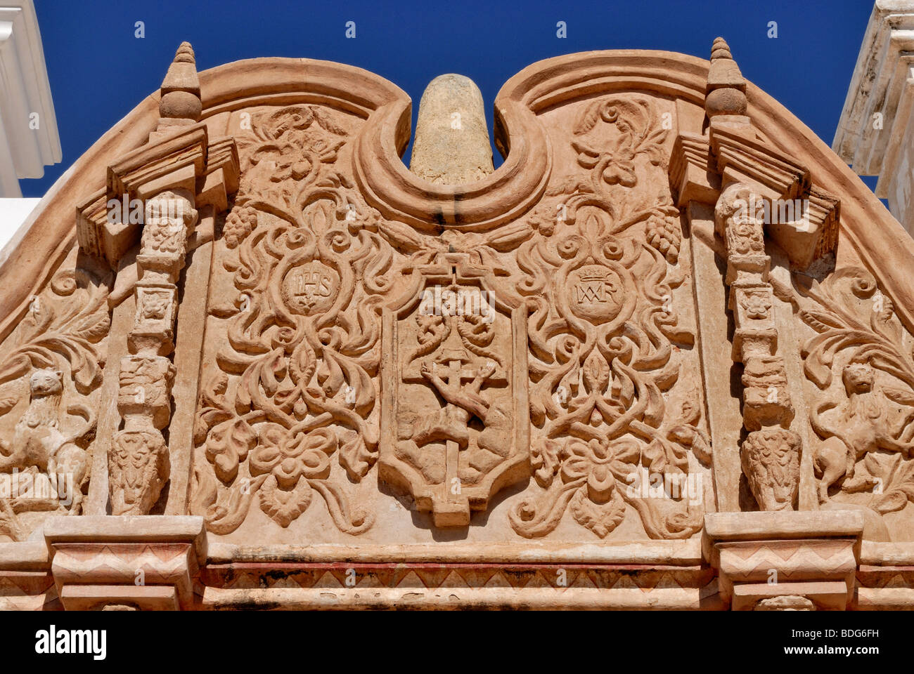 Baroque sandstone pediment above the main entrance of the Mission San Xavier del Bac, also known as 'white dove of the desert', Stock Photo