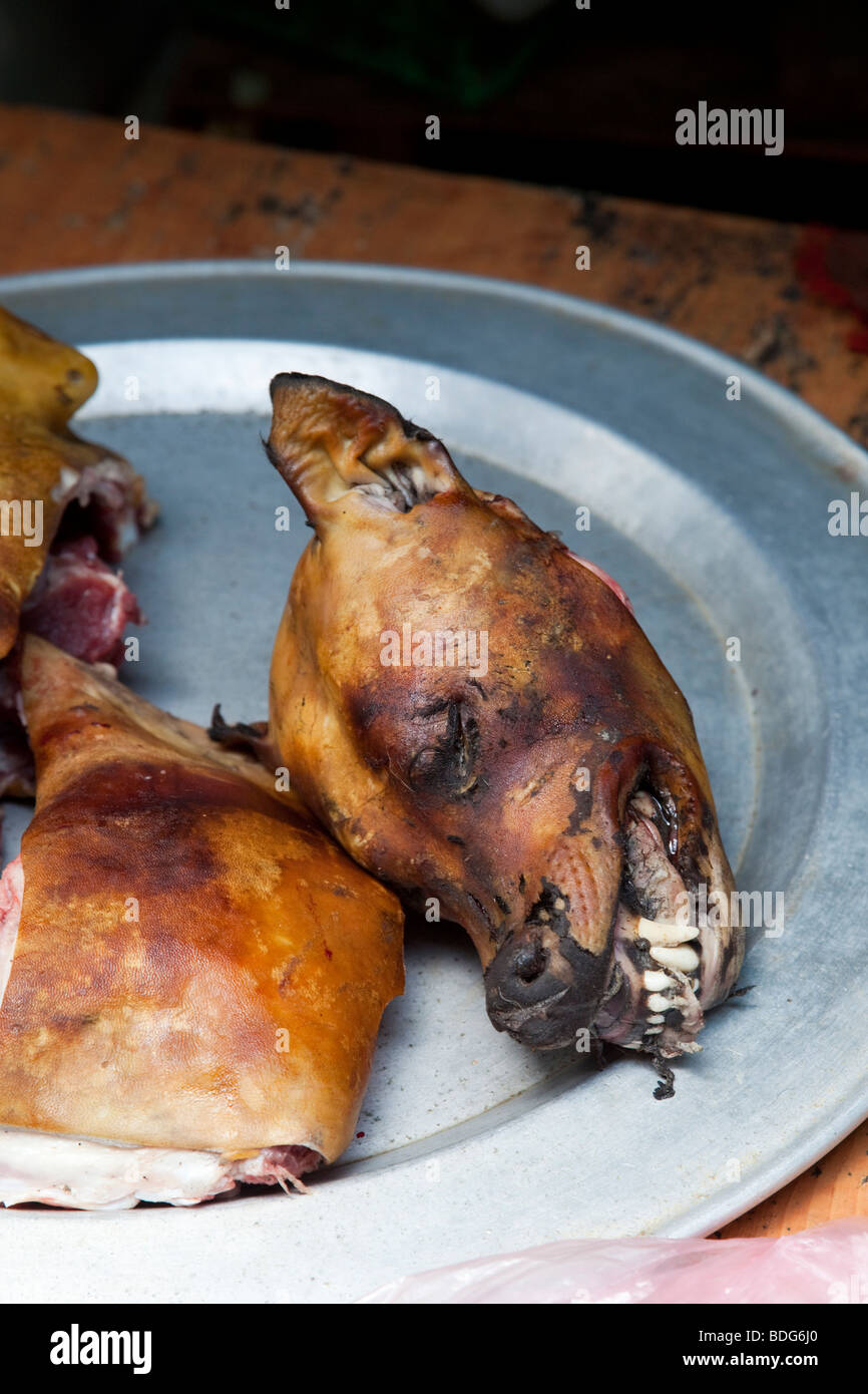 Cooked dog meat in a Vietnam market Stock Photo