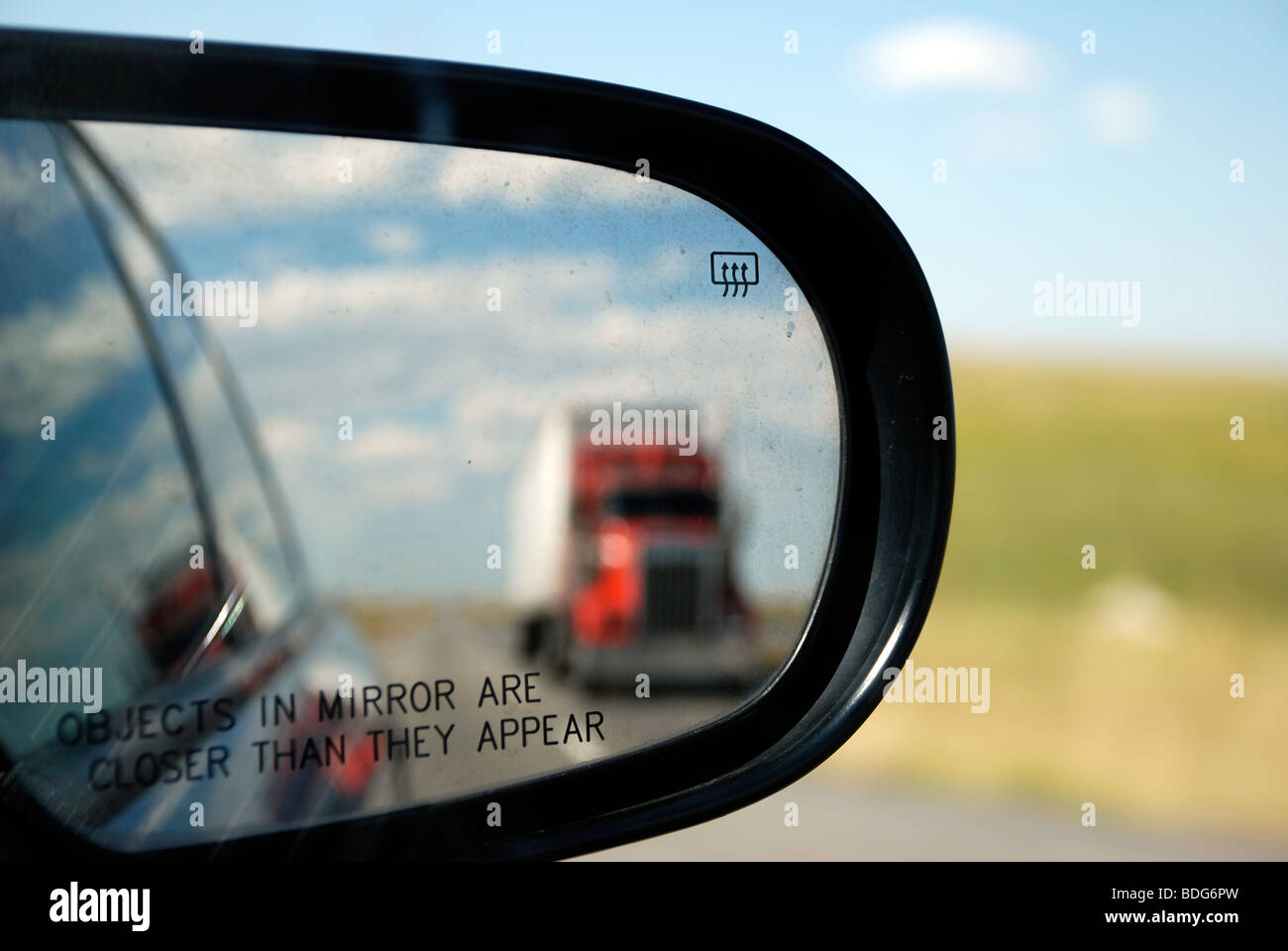 Truck in rear view mirror Stock Photo - Alamy