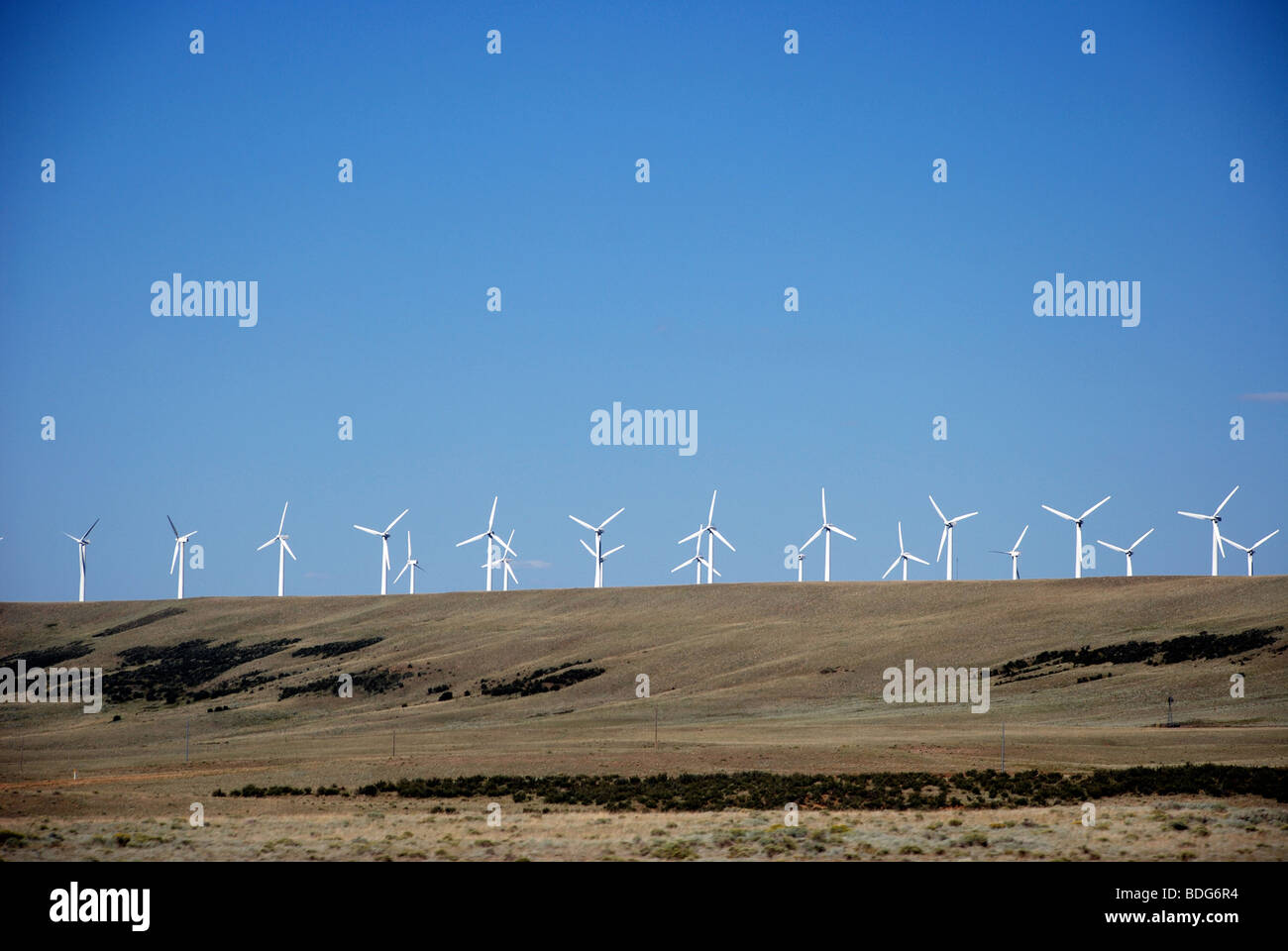 Windmills for power generation along Interstate 80 in Wyoming, USA Stock Photo