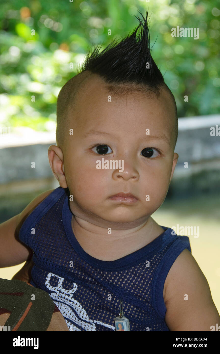 boy with a mohawk in Bangkok Thailand Stock Photo