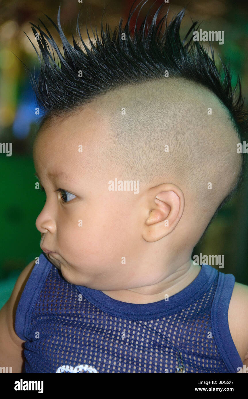 boy with a mohawk in Bangkok Thailand Stock Photo