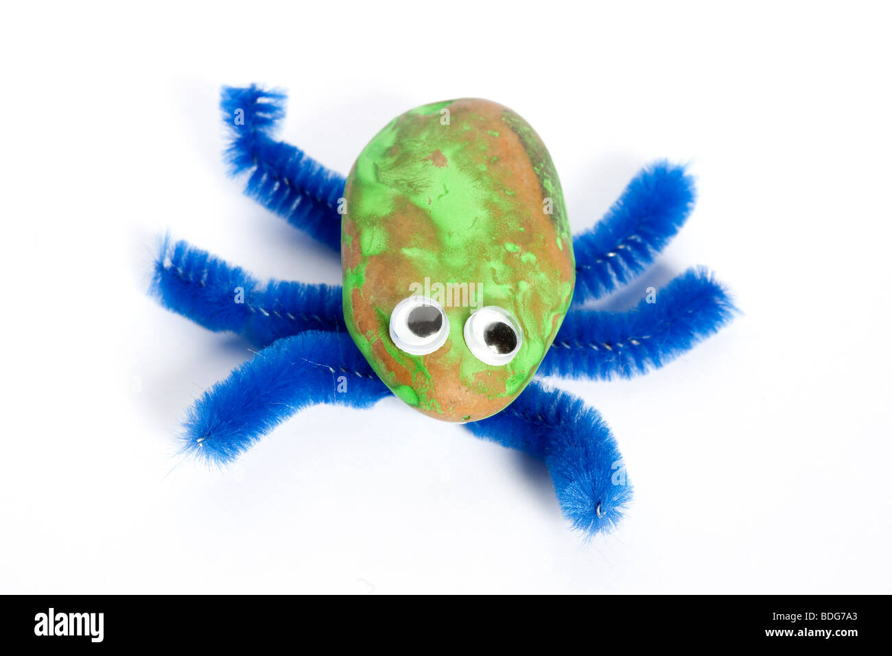 Toy bug made from a stone Stock Photo