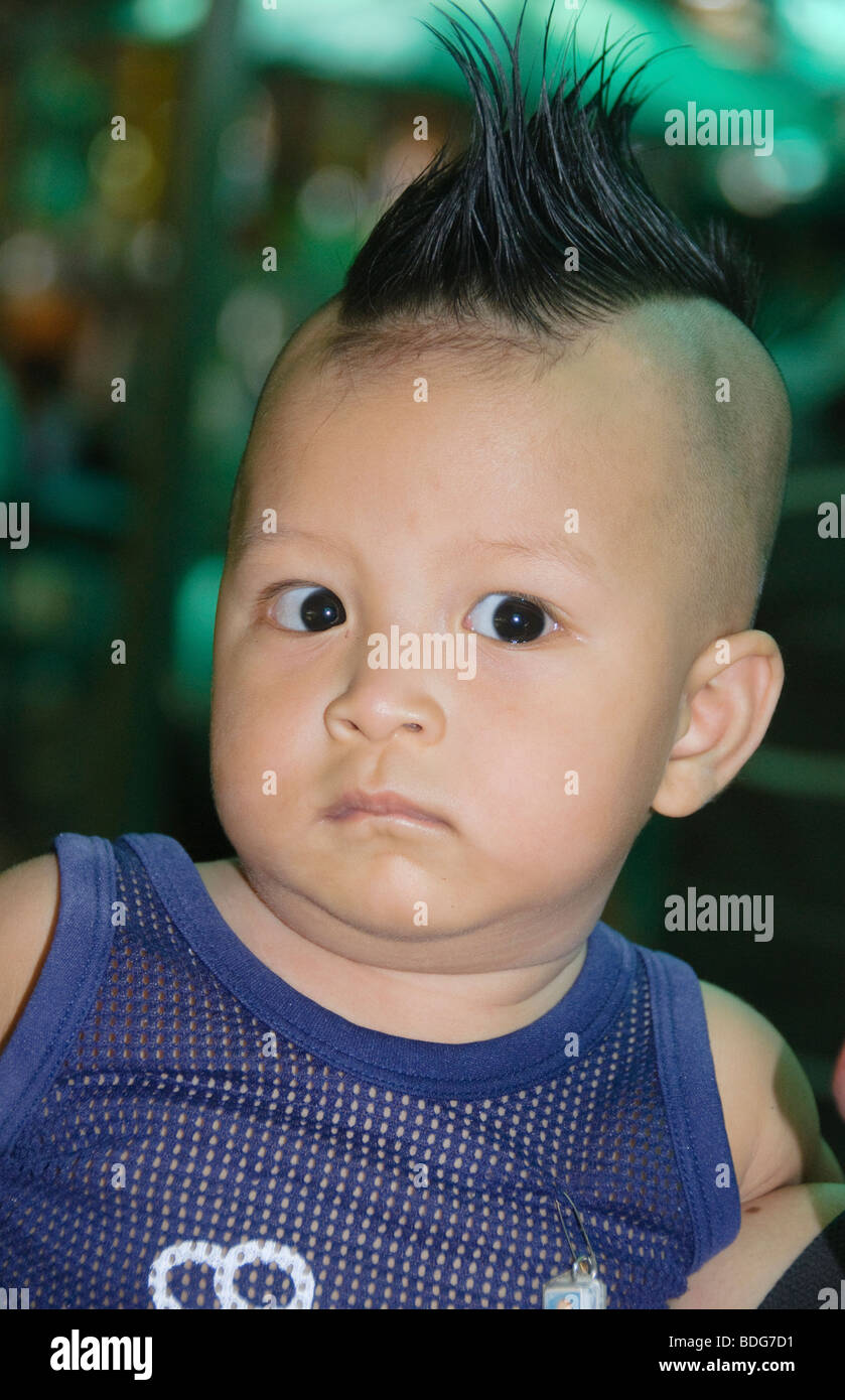 boy with a mohawk in Bangkok Thailand Stock Photo