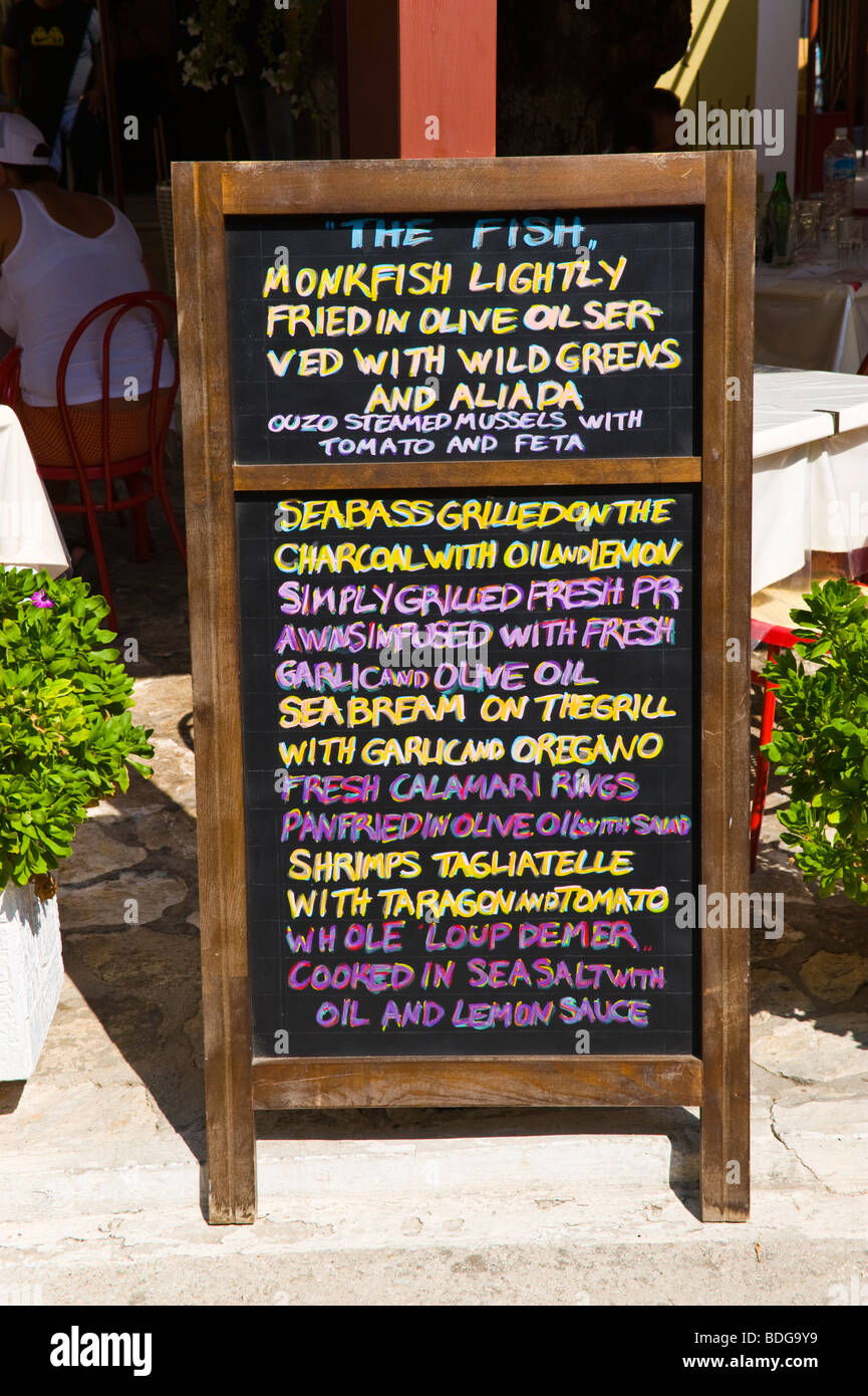 Chalk board menus with daily specials outside restaurant in village of