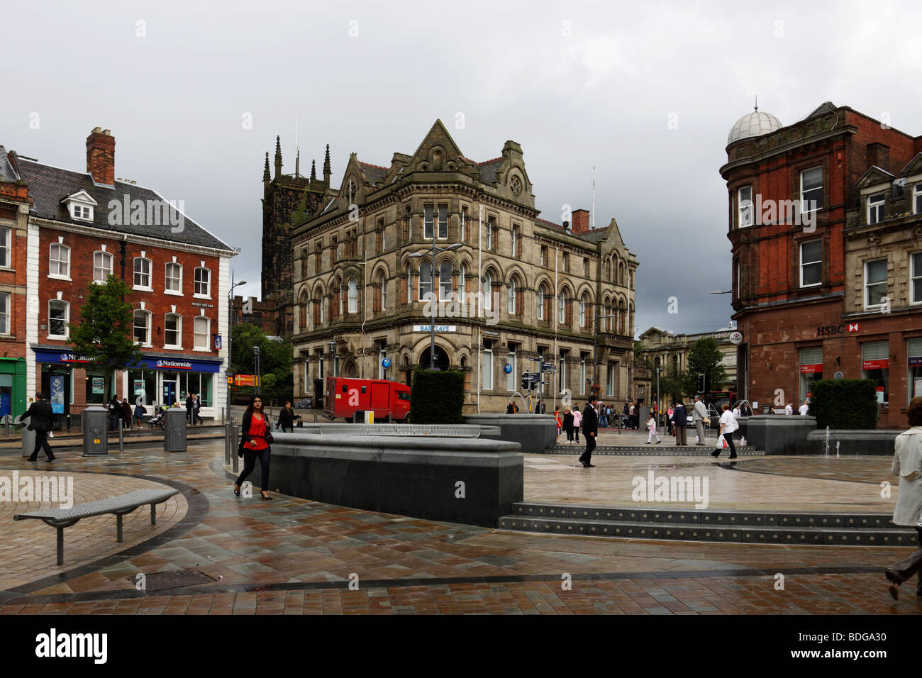 Queen's Square, Wolverhampton. Showing the new fountain water feature and surrounding banks Stock Photo