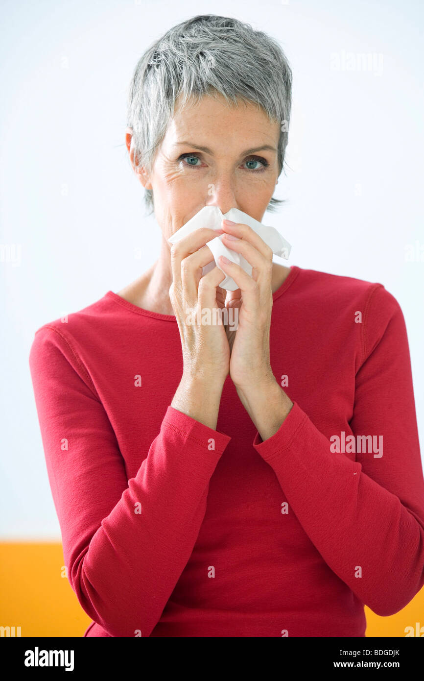 ELDERLY PERSON WITH RHINITIS Stock Photo