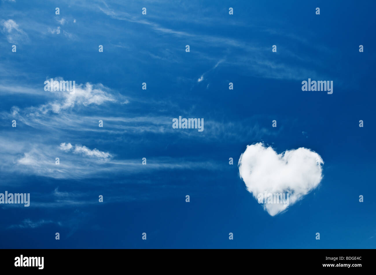 heart from cloud in blue sky Stock Photo - Alamy