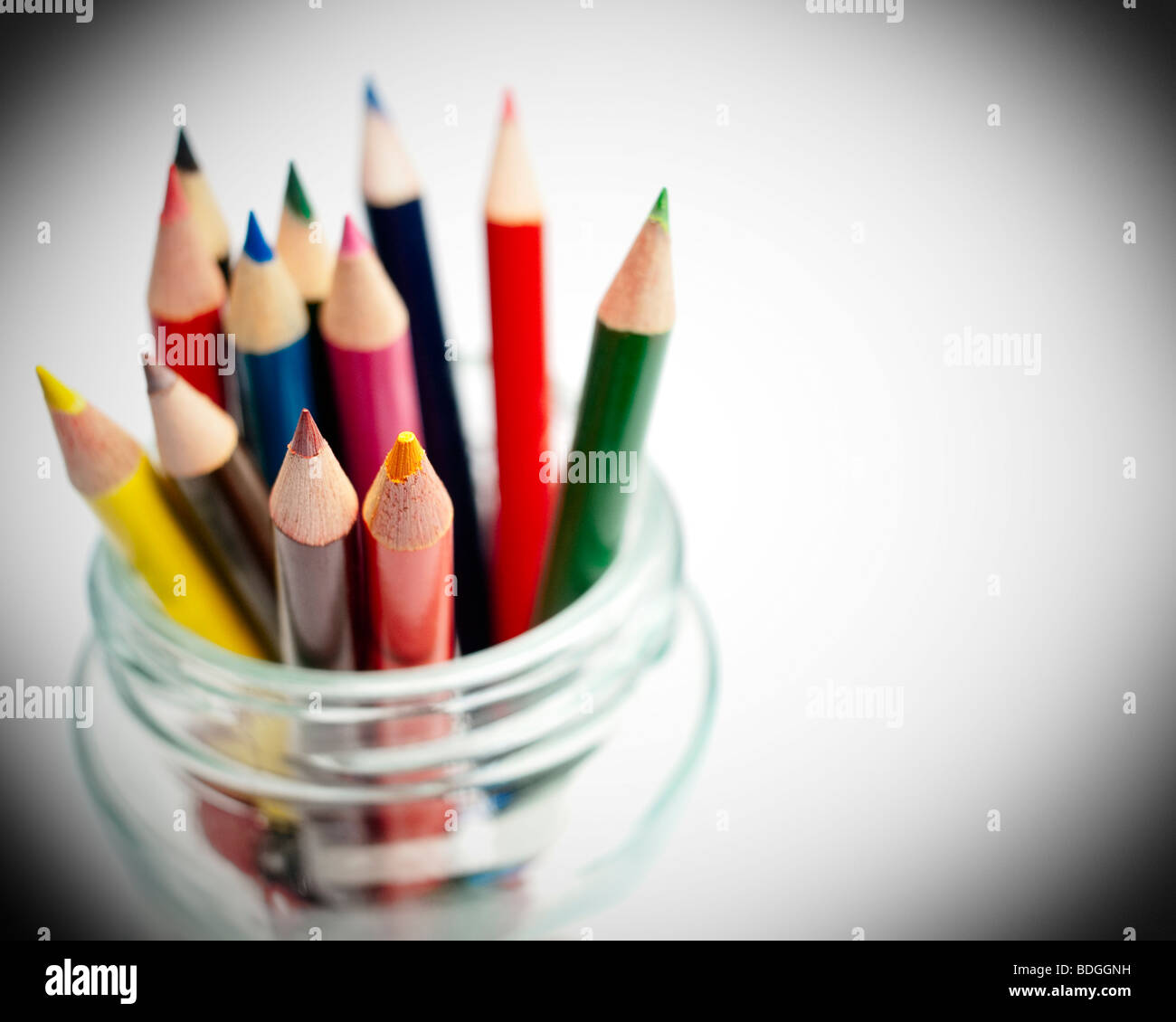 Coloured Pencils in a glass jar Stock Photo