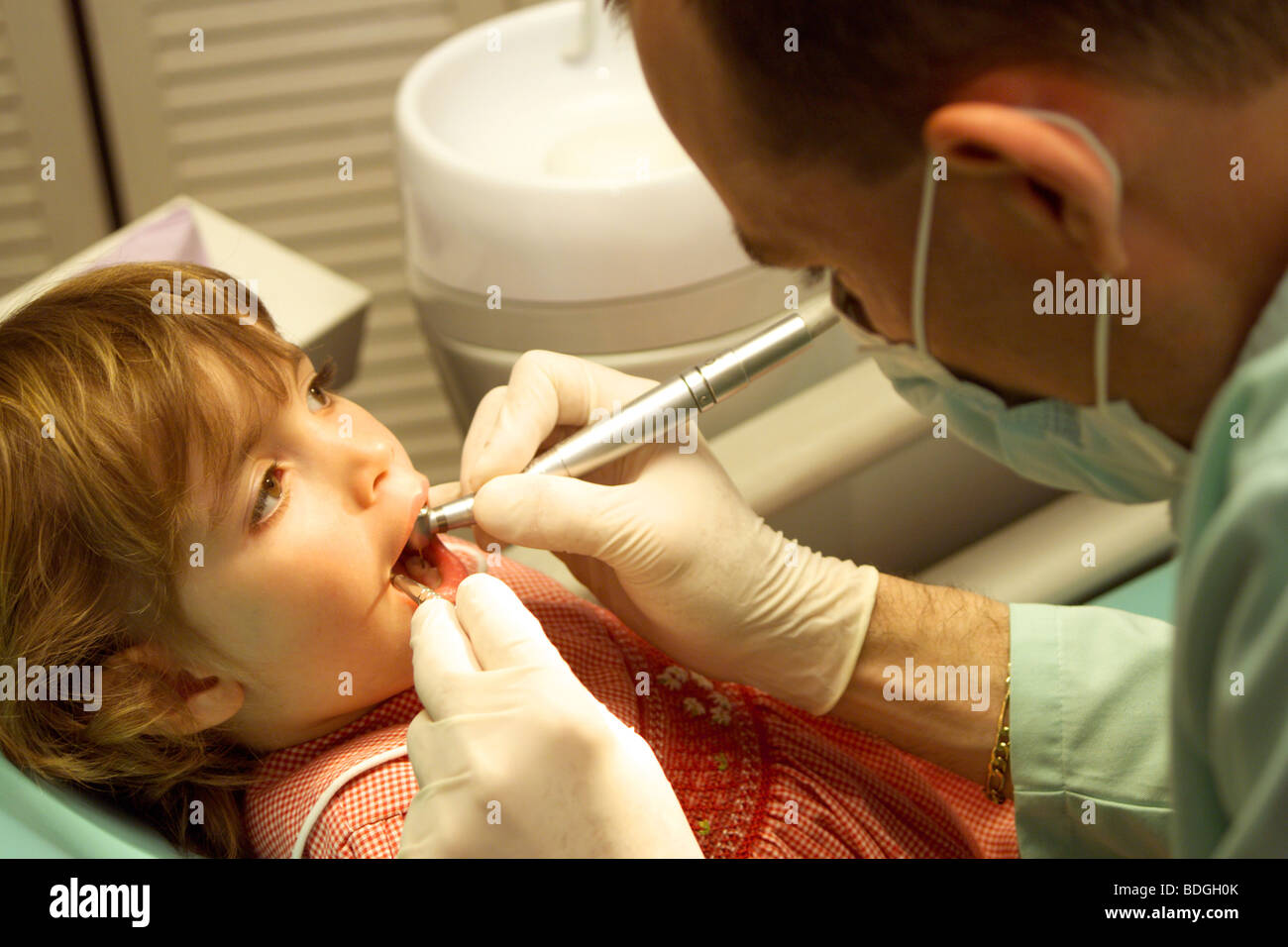 CHILD RECEIVING DENTAL CARE Stock Photo - Alamy