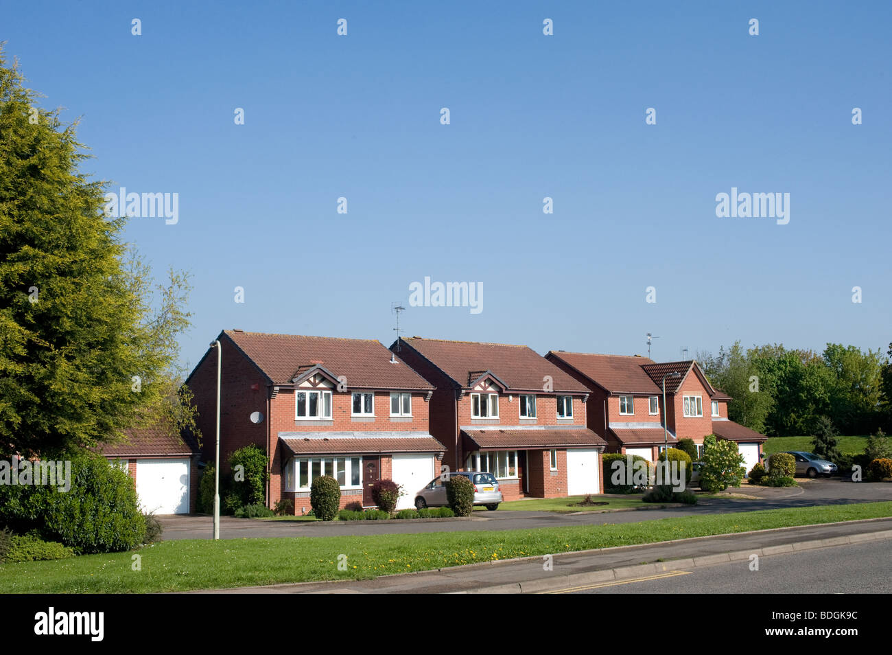 Quiet suburban housing estate in summer in England Stock Photo Alamy