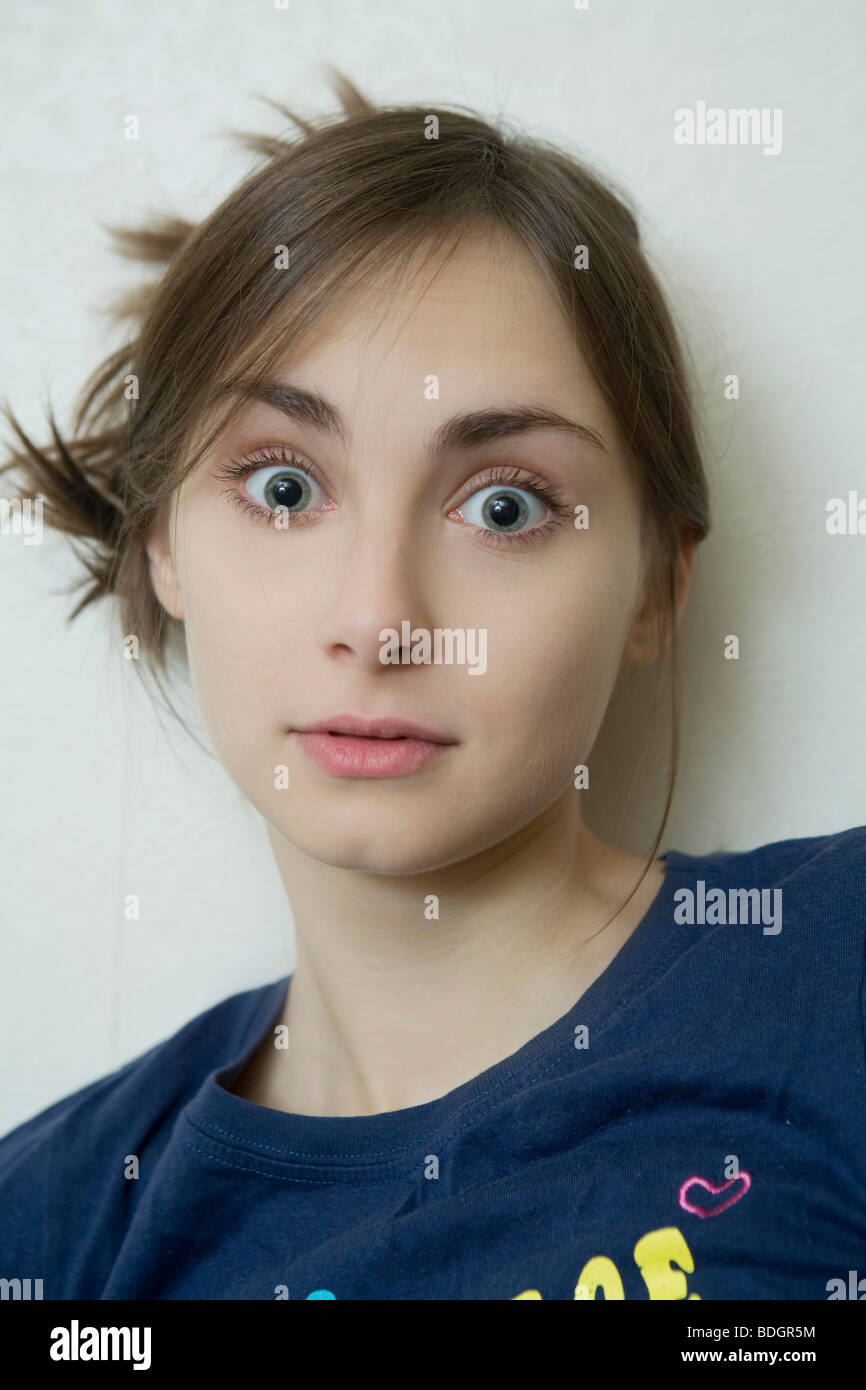 portrait of young surprised woman Stock Photo - Alamy