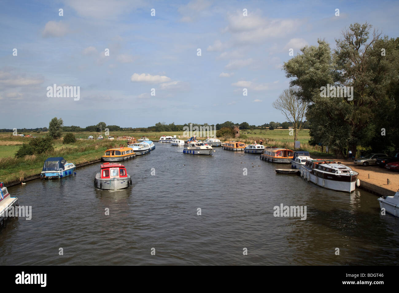 Boats on the river Ant at Ludham Bridge, Norfolk England Stock Photo