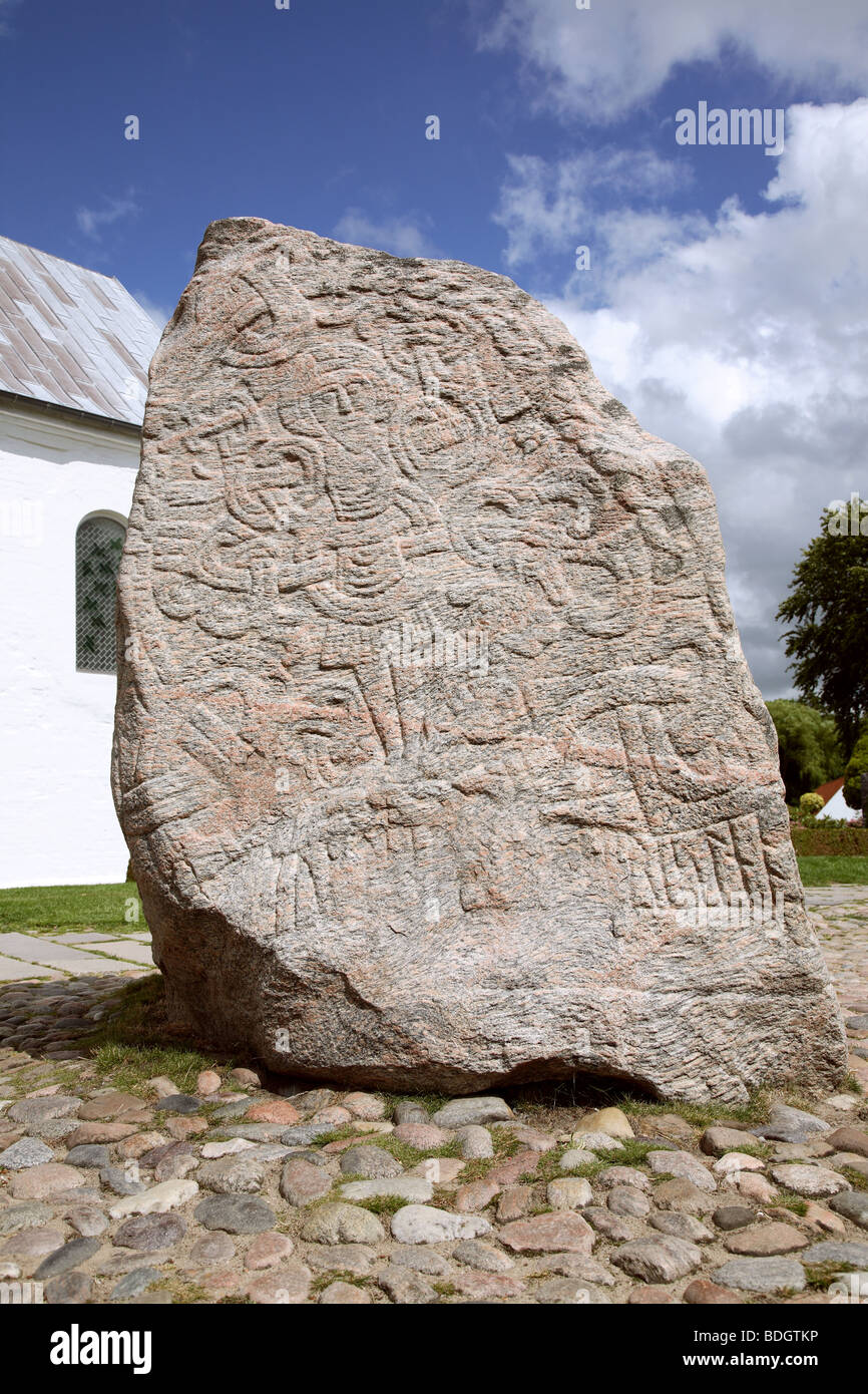 Jelling, Denmark. The figure of Christ on the large Jelling rune stone raised by King Harald Bluetooth in the 960s. Other side of runic text. Stock Photo