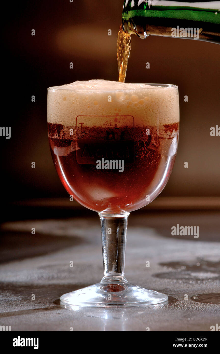 Pouring glass of Achel Belgian Trappist beer Stock Photo Alamy