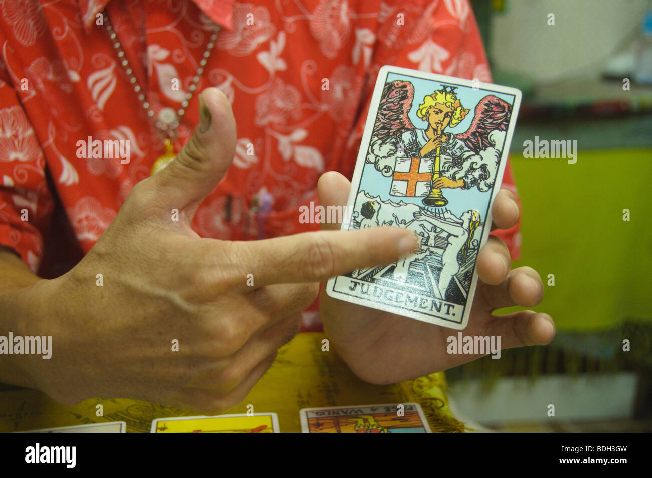 fortune teller in Bangkok Thailand giving a tarot card reading Stock Photo
