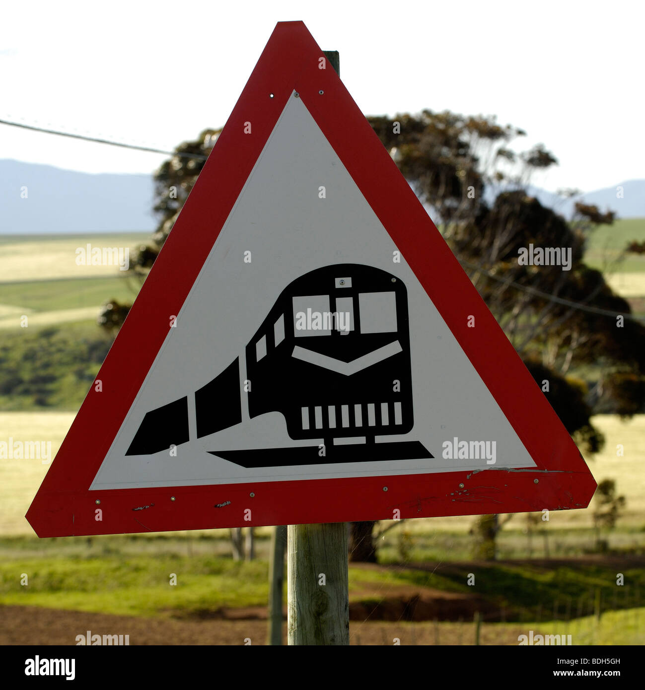 Road warning sign 'unguarded train crossing' South Africa, Africa. Stock Photo