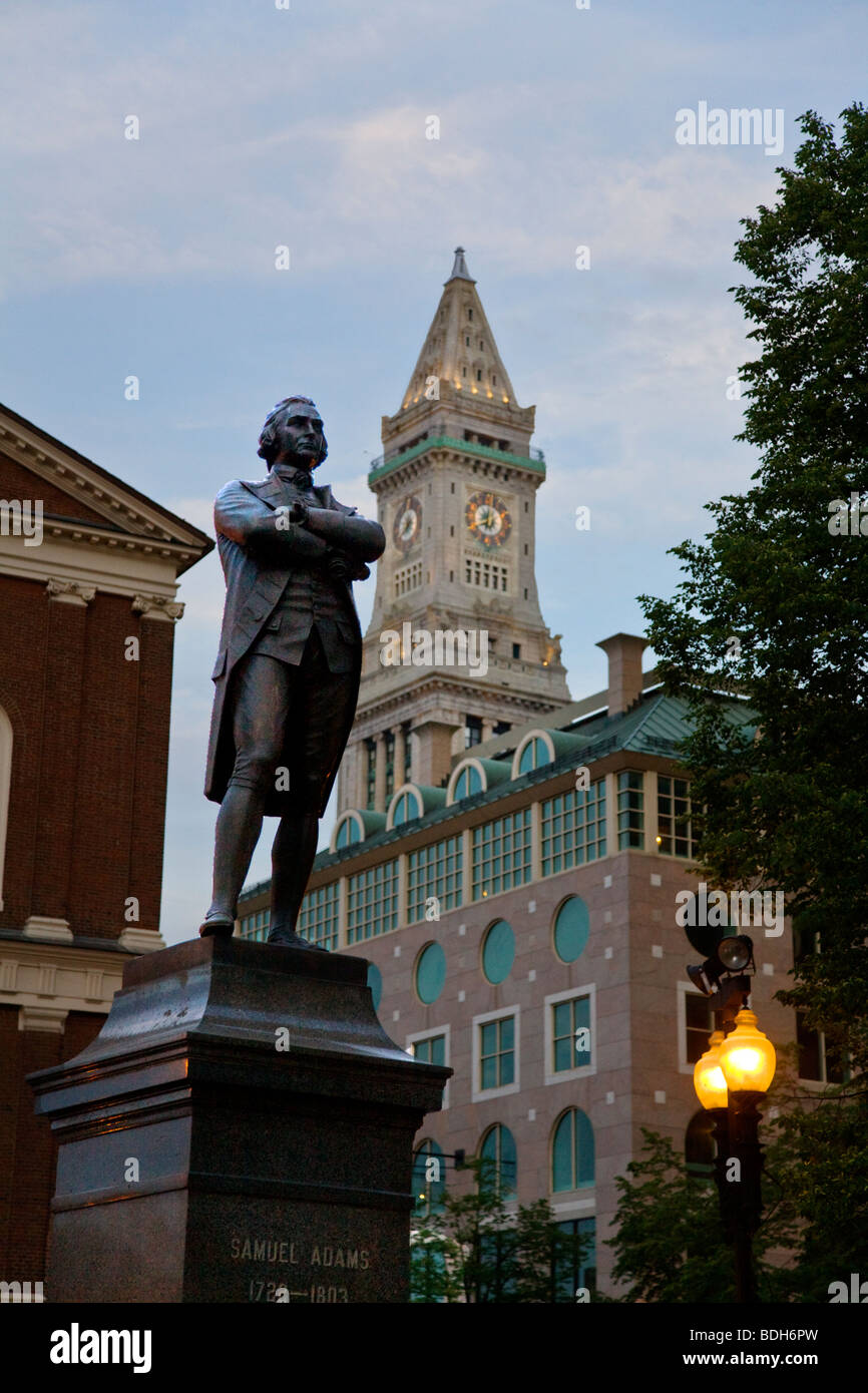 Statue of SAMUEL ADAMS in front of FANEUIL HALL with CUSTOM HOUSE TOWER behind - BOSTON, MASSACHUSETTS Stock Photo