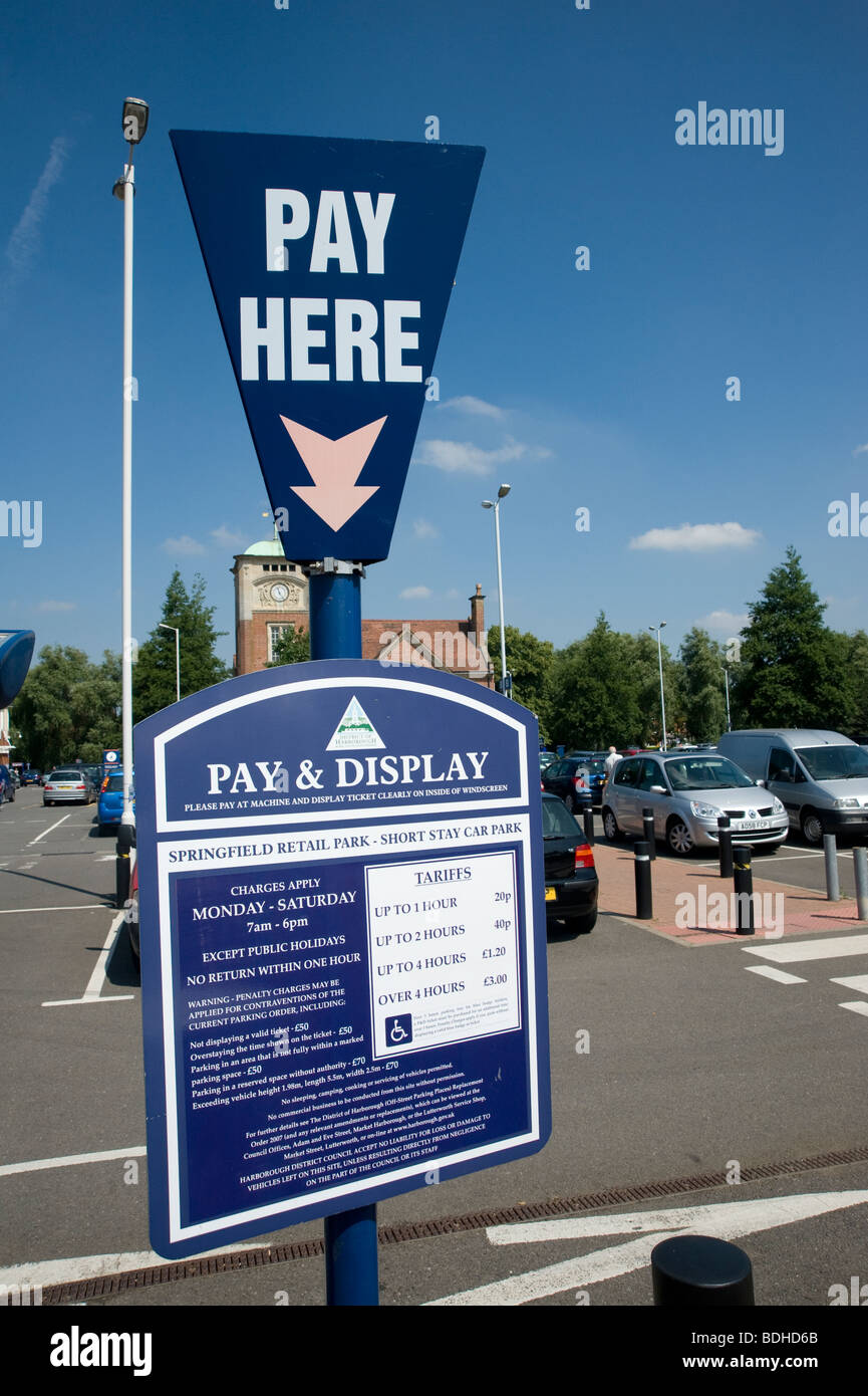 Pay and display sign in a car park at a retail shopping centre in England Stock Photo