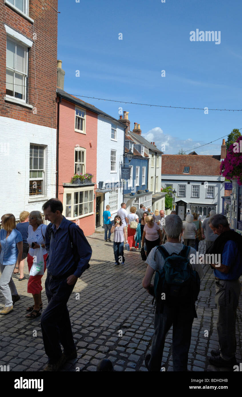 Visitors in Quay Street, cobbled pedestrian area, Lymington, Hampshire, England, UK Stock Photo