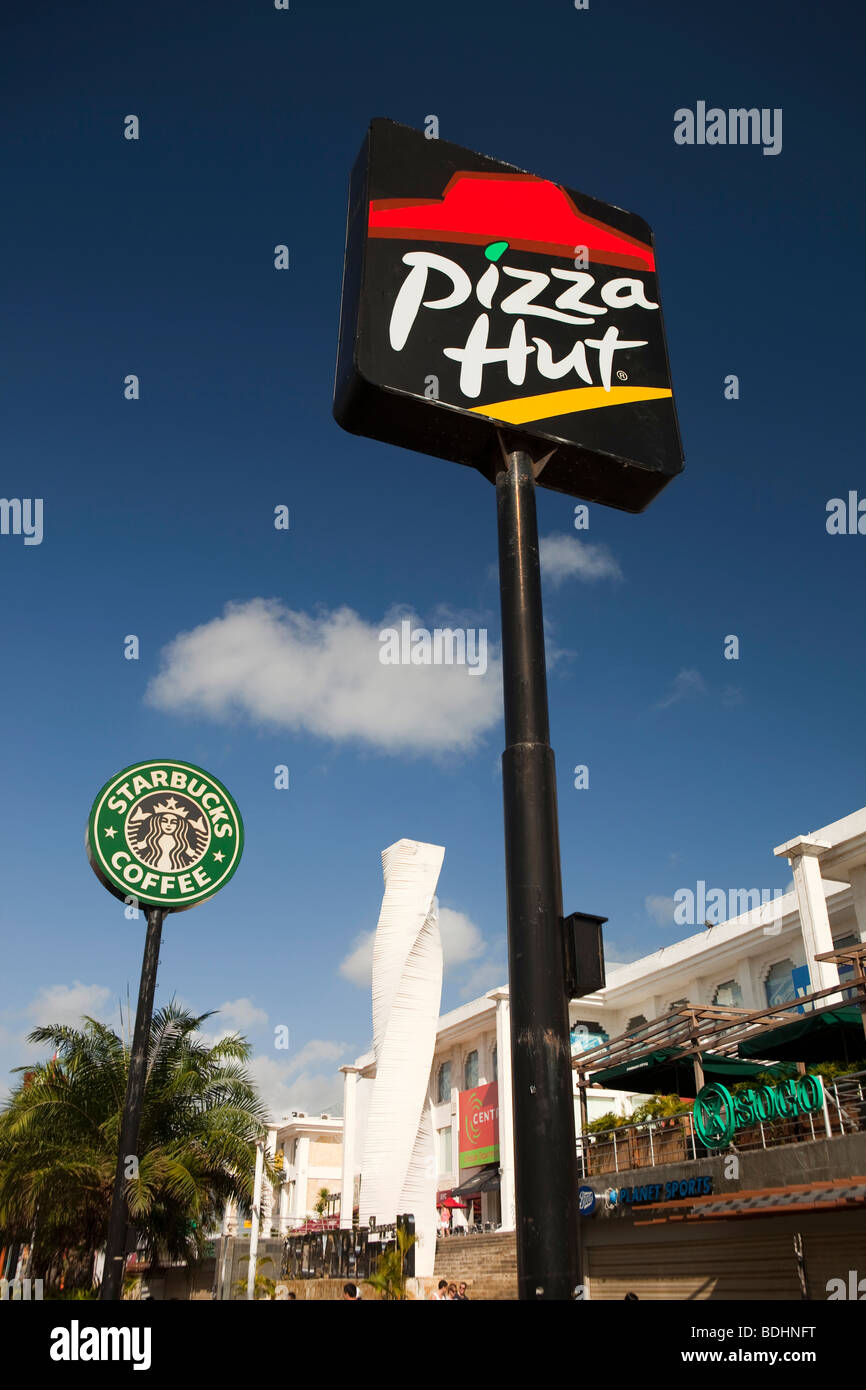 Indonesia, Bali, Kuta, Jalan Kartika Plaza, Pizza Hut and Starbucks Coffee signs Stock Photo
