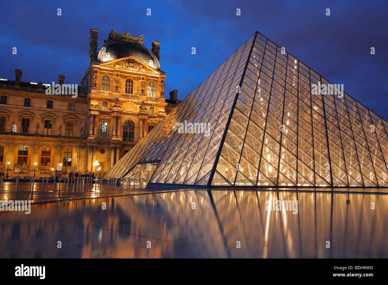 The Louvre Museum at night, Paris, France Stock Photo