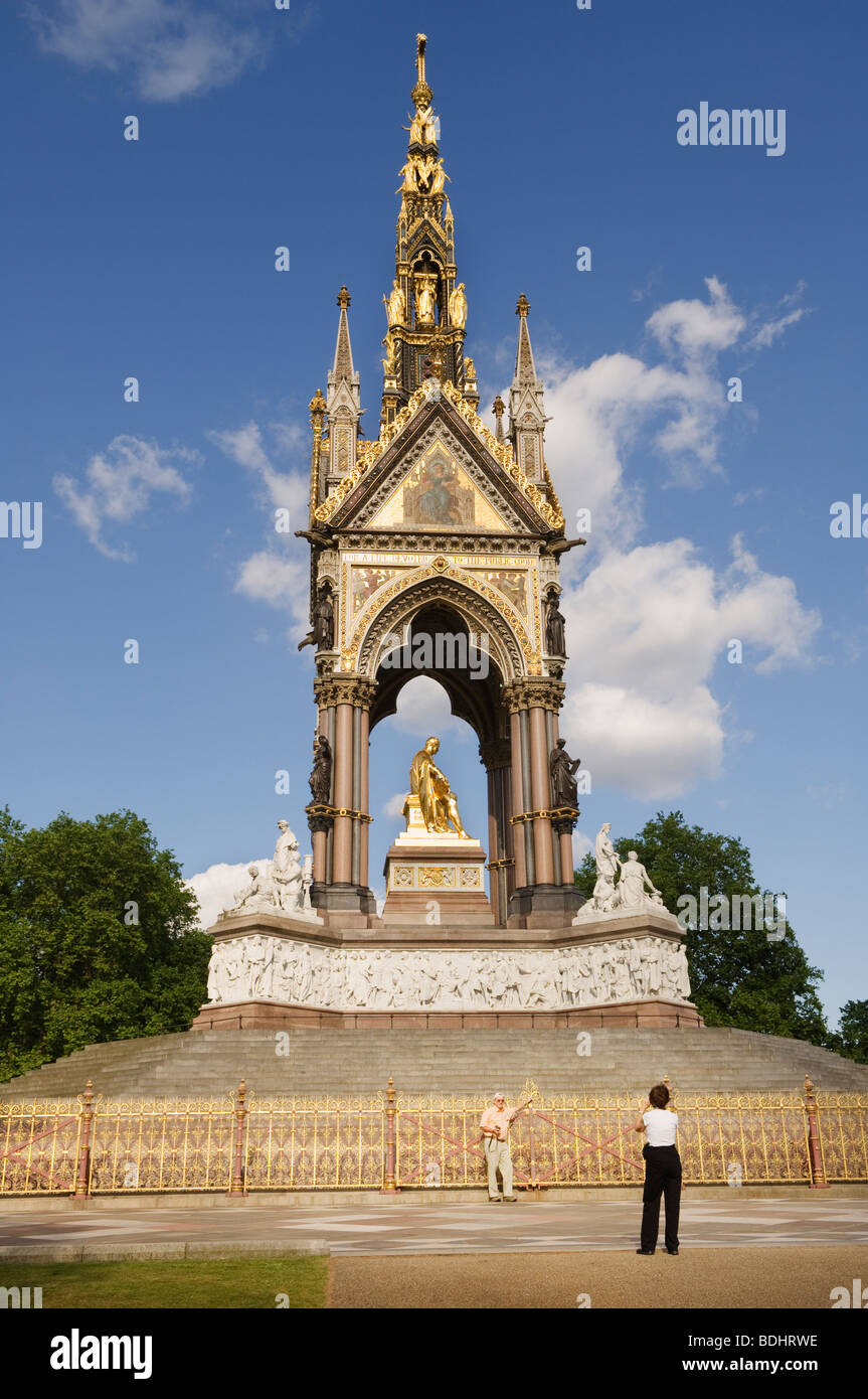 Tourist posing in front of the Prince Albert Memorial in Hyde Park. Stock Photo