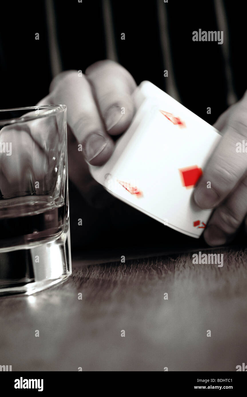 Man shuffling deck of cards Stock Photo