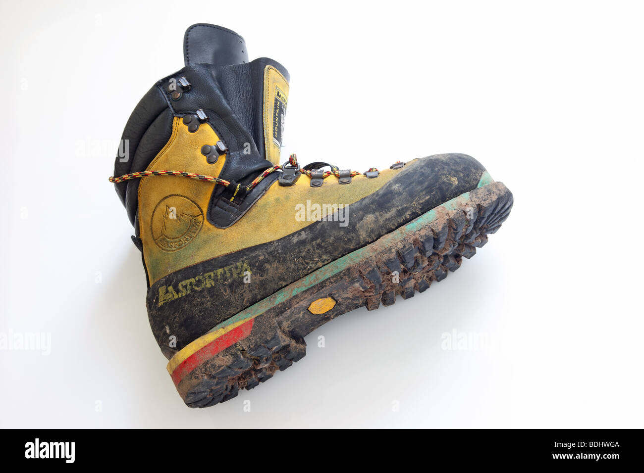 Muddy Winter Mountaineering Boot Stock Photo