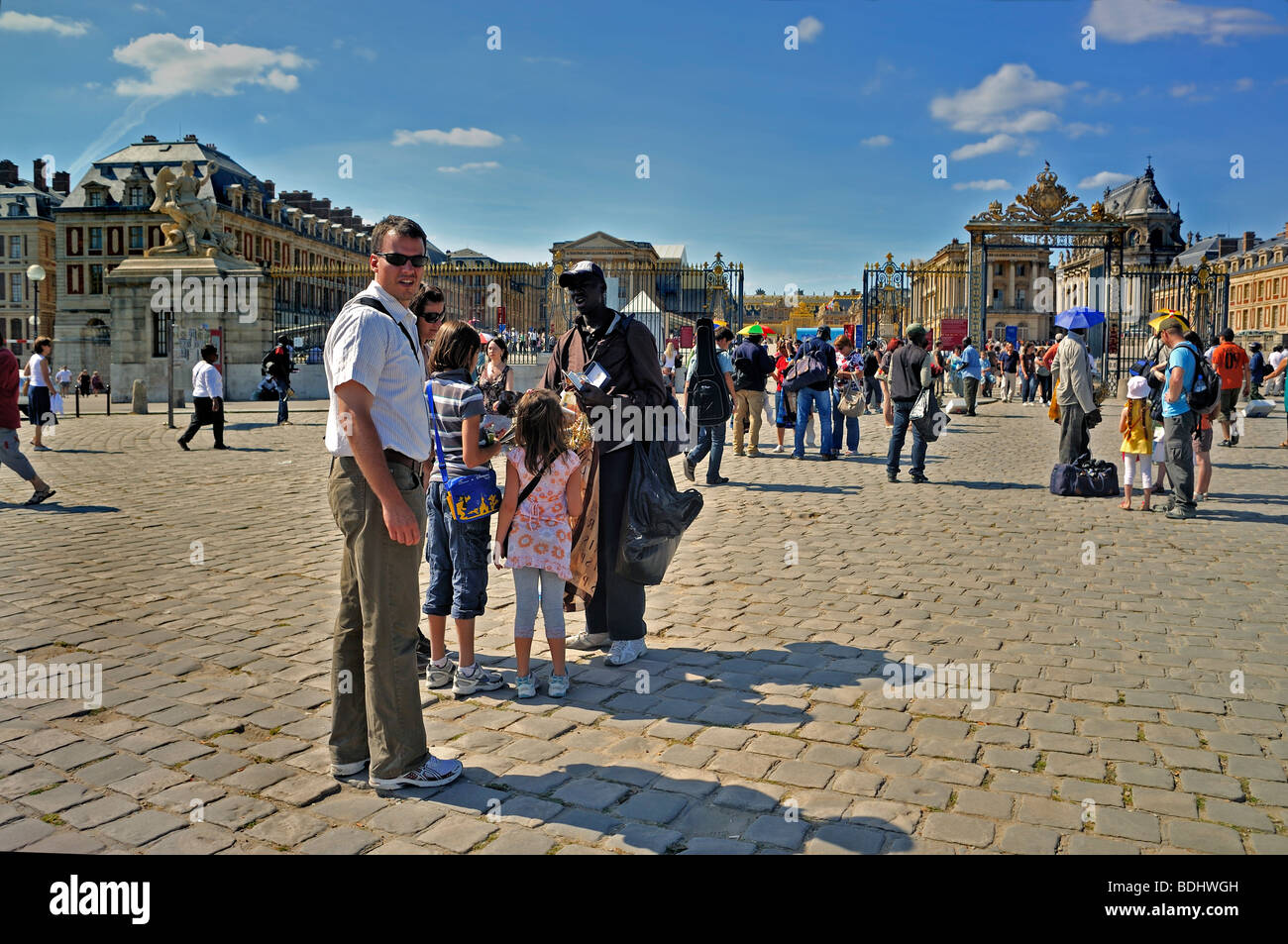 Paris, France - Tourist Family with Children, Visiting 'French Monument', 'Chateau de Versailles', Buying Paris Souvenirs, front of French chateau,, Stock Photo