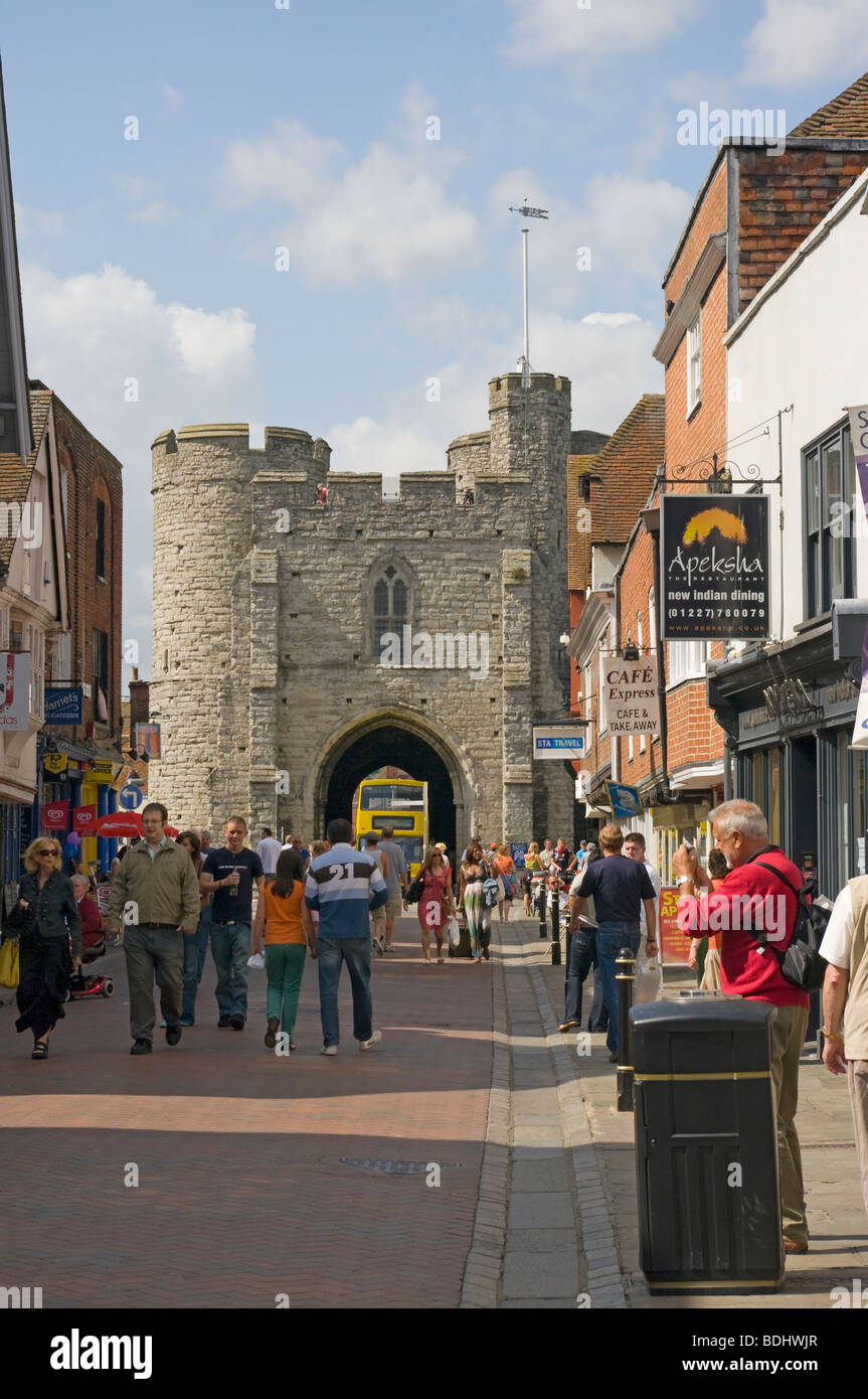 The High Street Canterbury Kent England Busy With Shoppers With The Historical West Gate In The Distance Stock Photo
