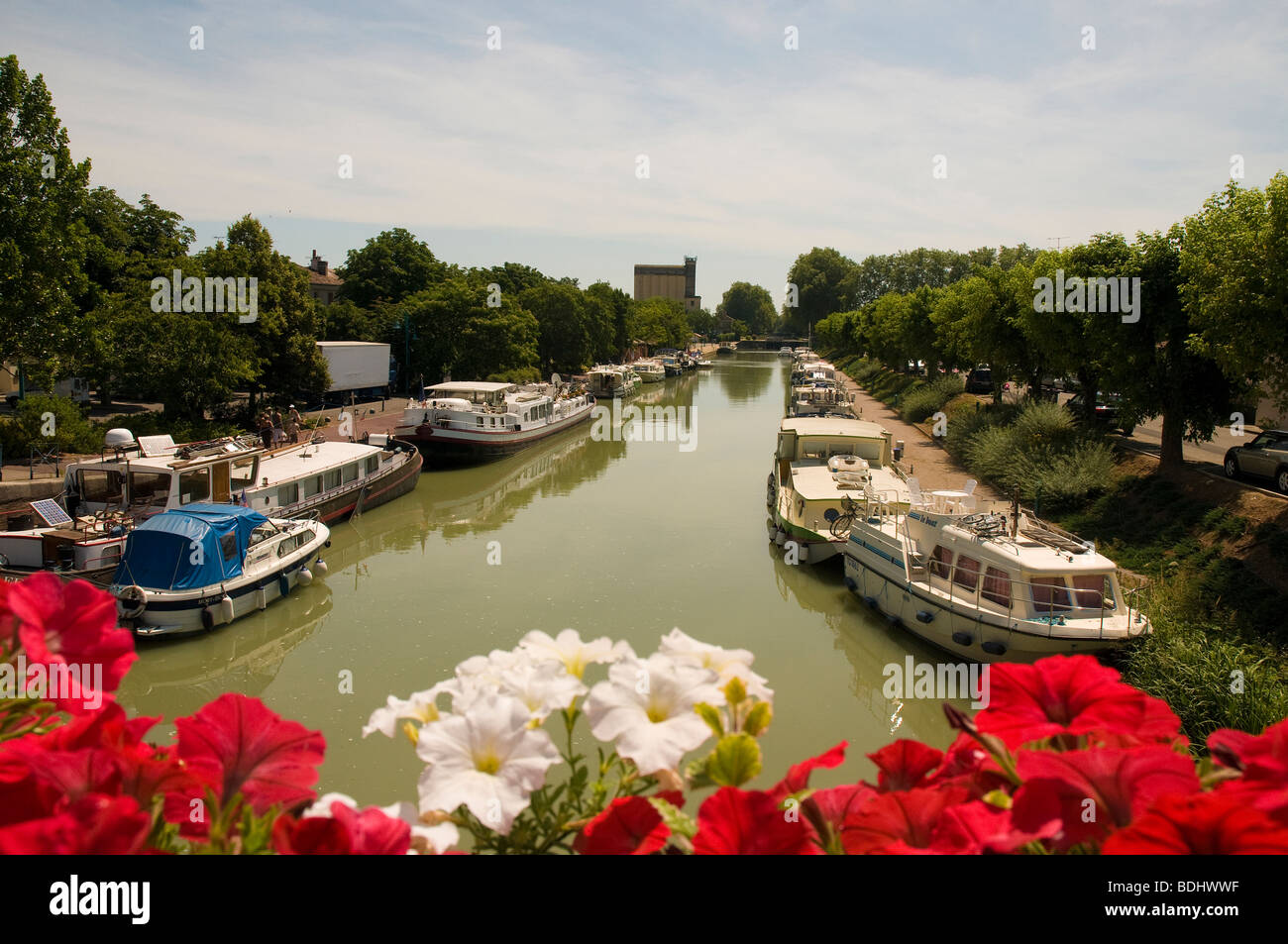 France:  Canal leisure boats in the port at Moissac on the Canal Lateral de la Garonne which connects to the Canal du Midi. Stock Photo