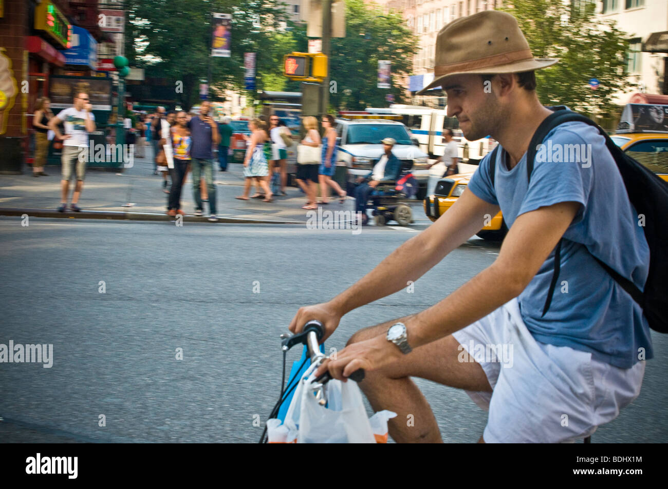 Man on bike w backpack in NYC Stock Photo Alamy