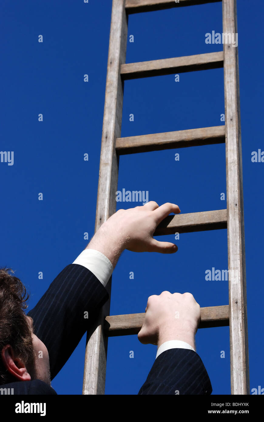 Climbing the ladder of success Stock Photo
