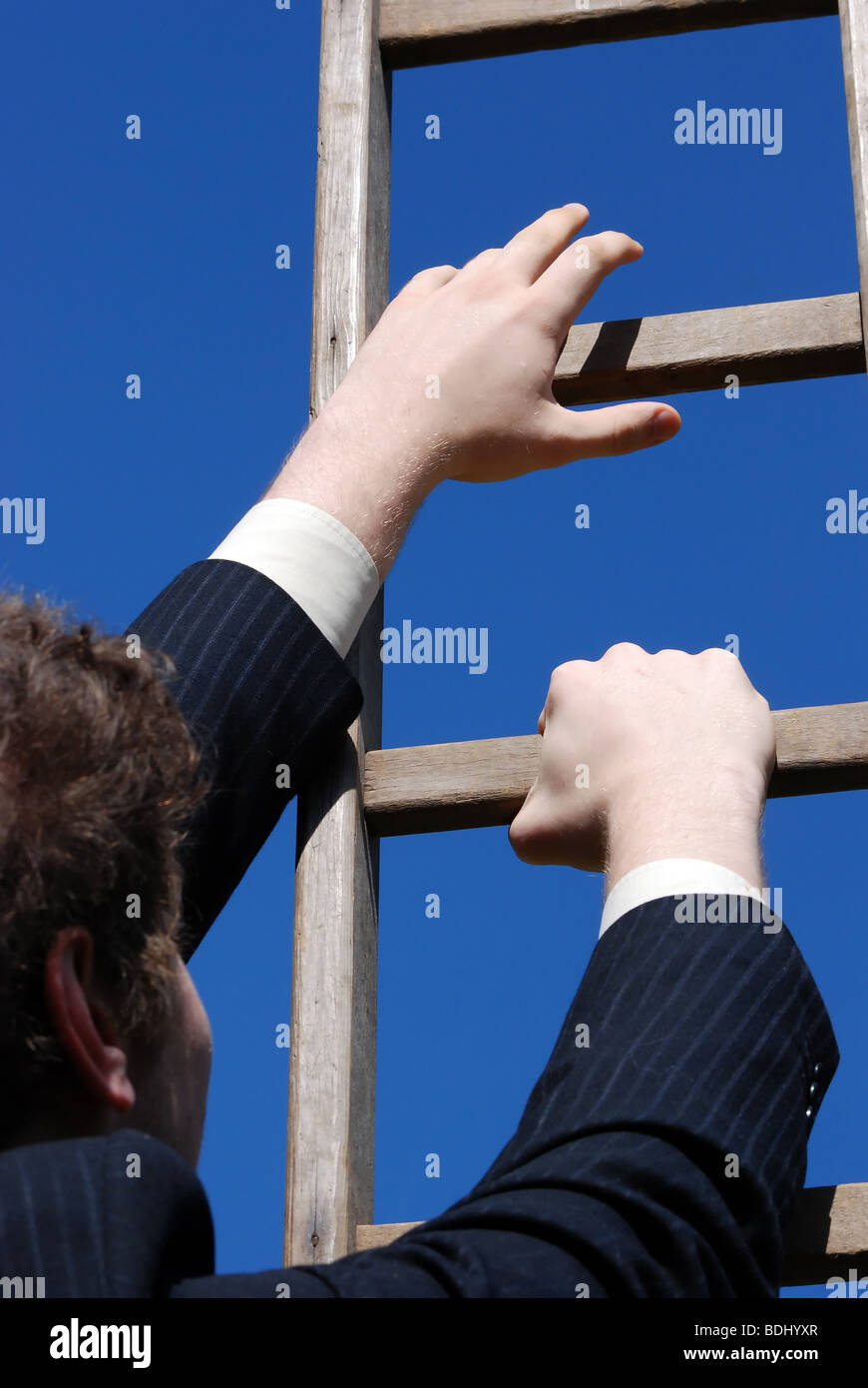 Climbing the ladder of success Stock Photo